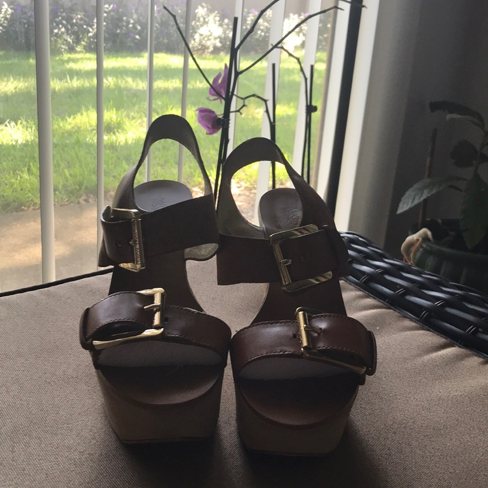 MICCHAEL KORSE WEDGE SANDAL WITH WIDE BUCKLE .